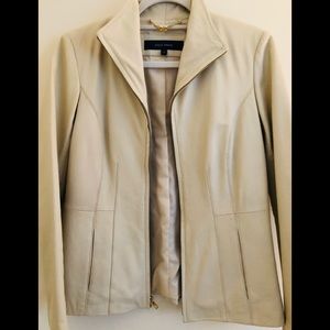 COLE HAAN woman’s leather jacket.